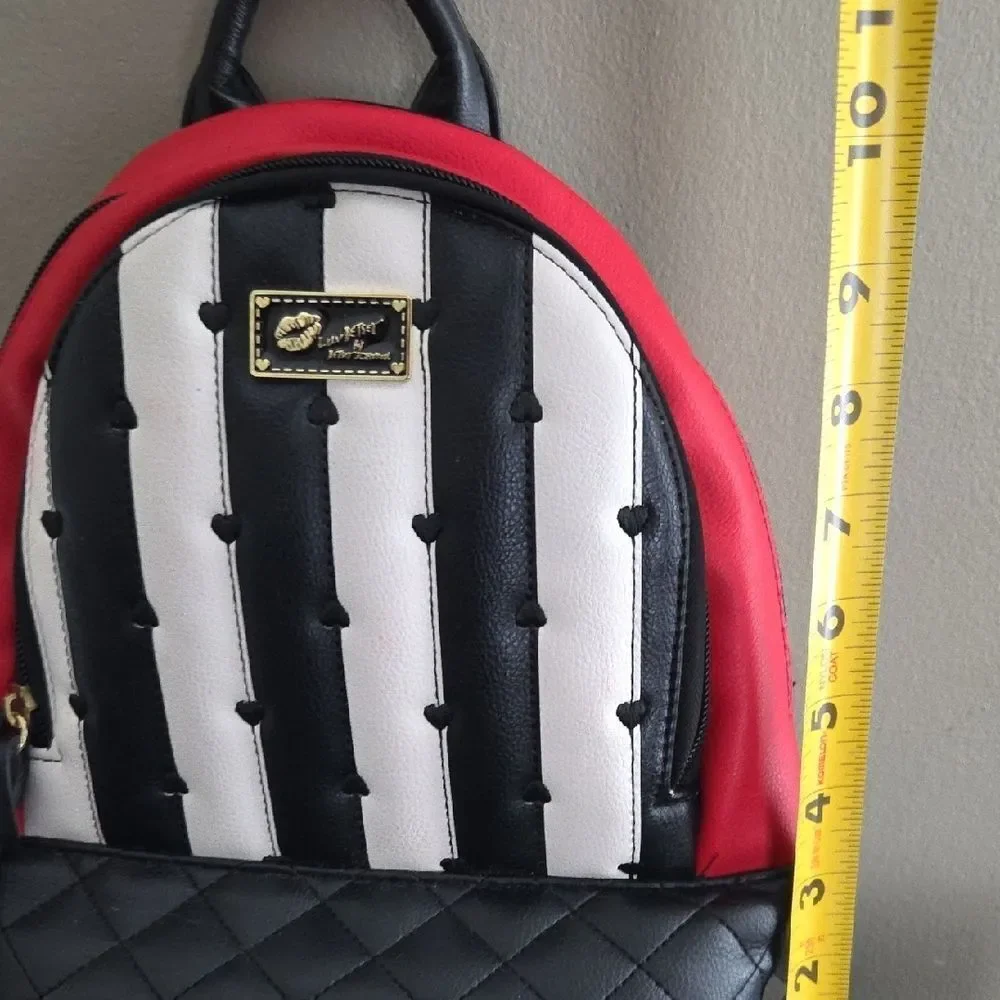 Betsey Johnson Black and White Striped Backpack with Red Accent